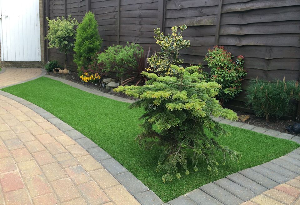 Artificial Grass Norwich - New artifical grass with inset planting