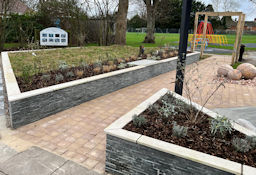 Raised beds with porcelain veneers