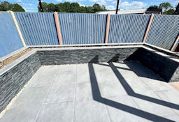 Porcelain patio with Porcelain veneered retaining walls